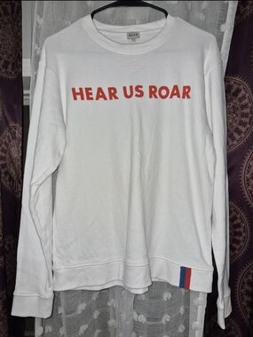 KULE White 'Hear Us Roar' Crewneck Sweatshirt with Red Logo